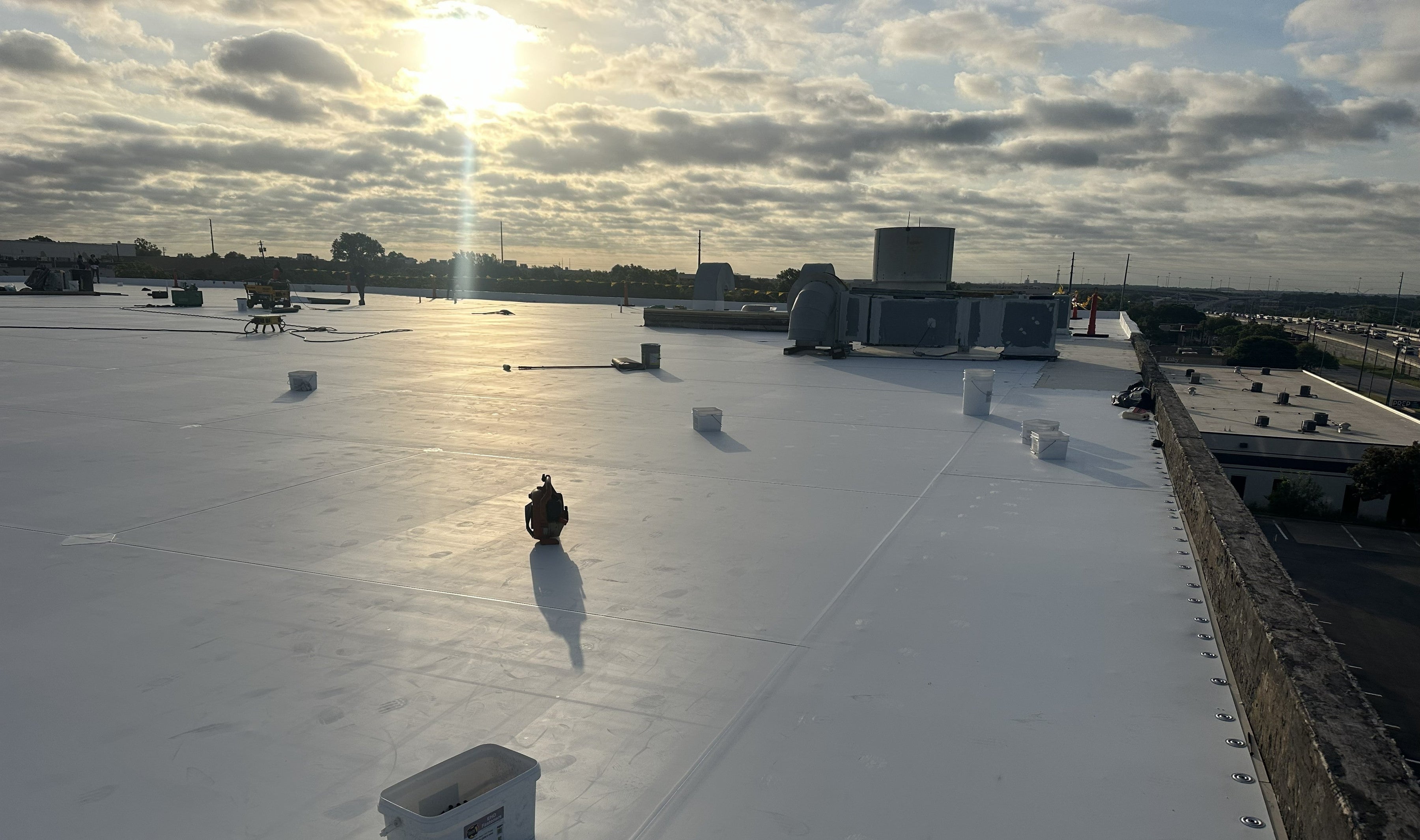 TPO commercial roof installation.