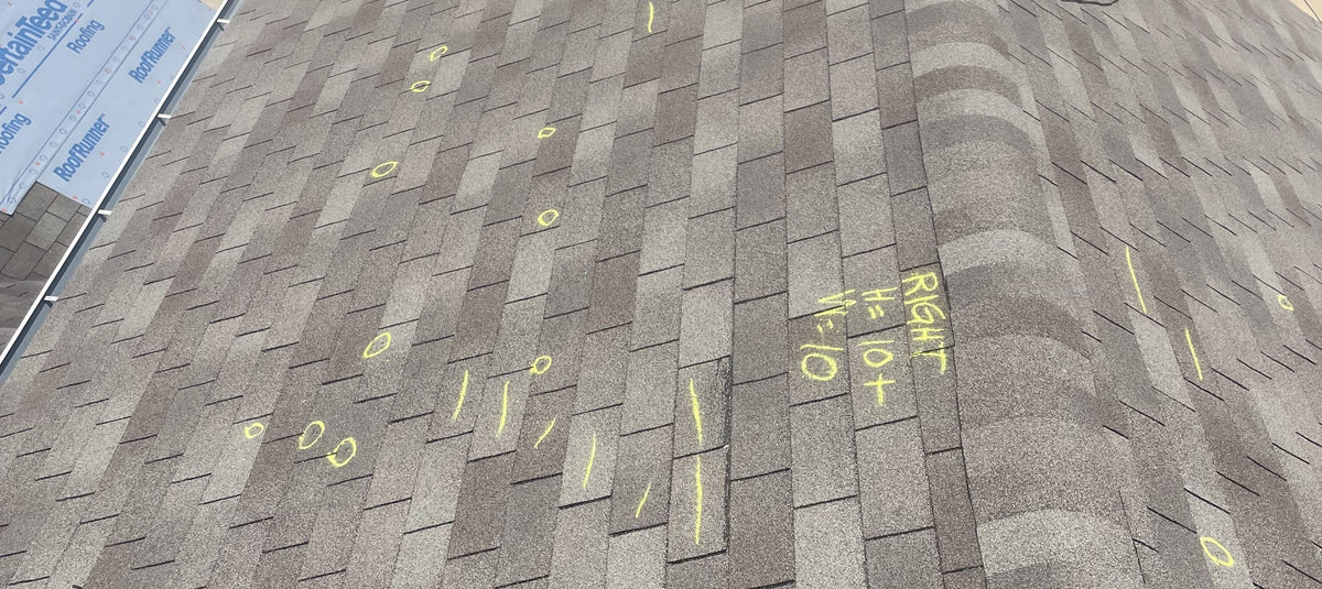 Hail damage on asphalt shingle roof in Houston, TX documented for insurance claim.