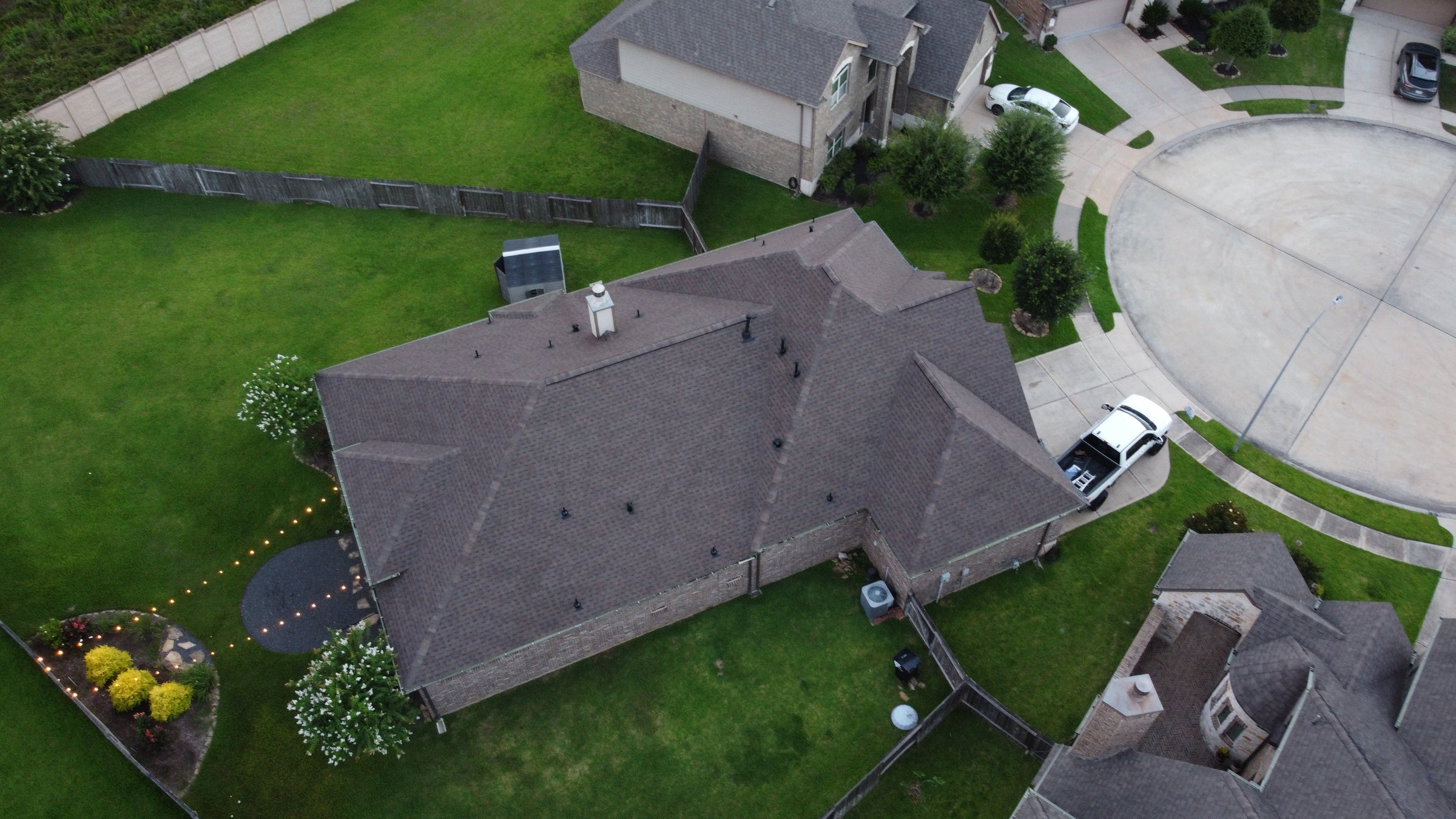 Aerial view of a roof installed by Prime Property Builders in Richmond, TX