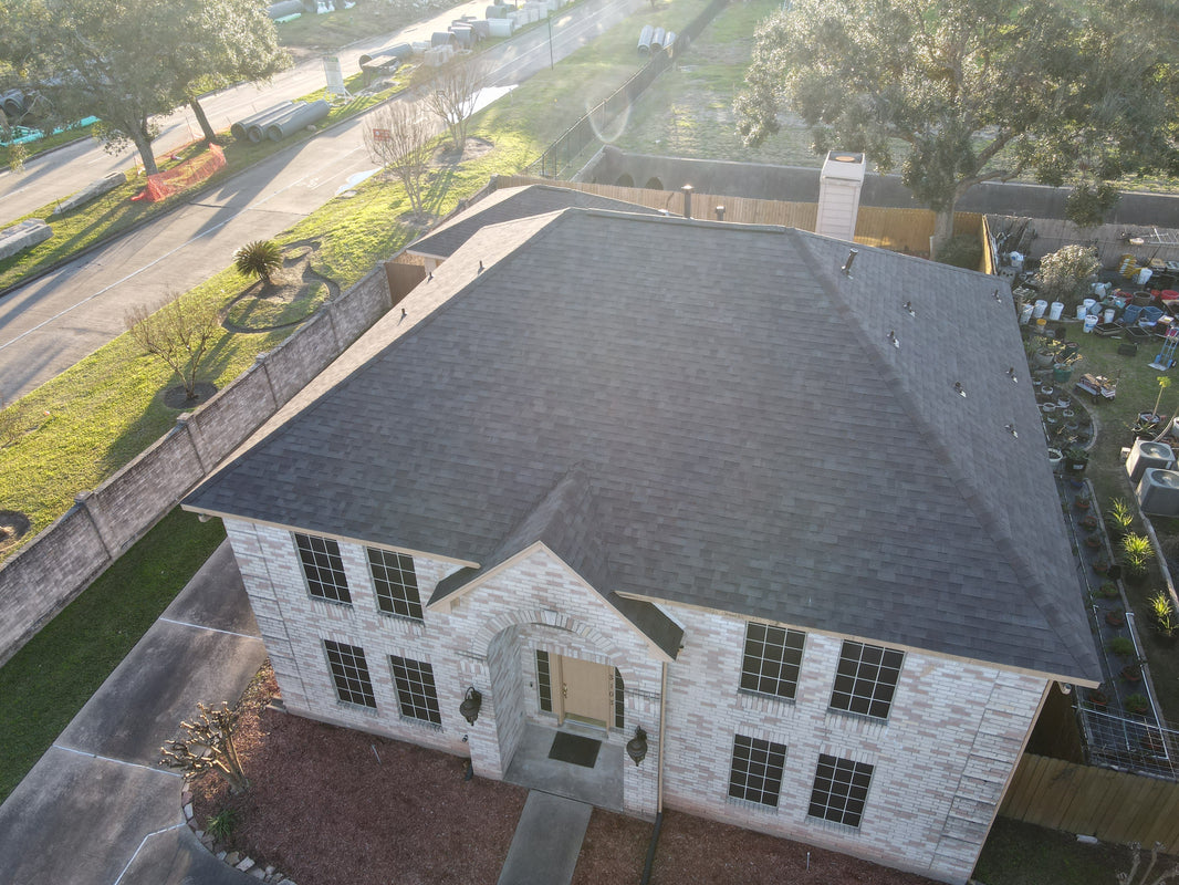 Completed residential roof replacement with new asphalt shingle system installed by Prime Property Builders in Texas